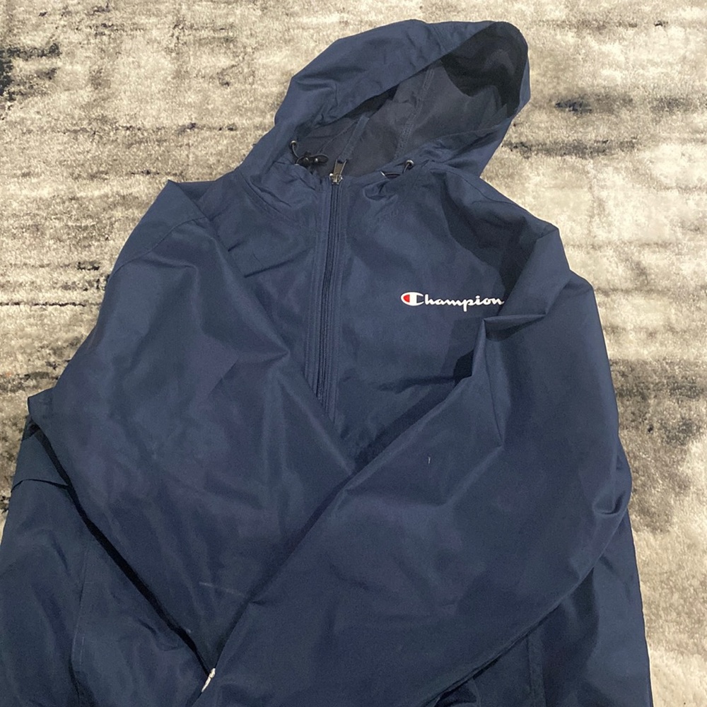 Navy blue sinched champion wind breaker